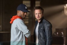  Aaron Paul with Scott Mescudi (Kid Cudi) in DreamWorks Pictures' NEED FOR SPEED. 144422 photo