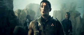 Predators target Royce (Adrien Brody) with their trademarked laser targeting. Edit: The trailer was very different from the movie. See http://io9.com/5584437/why-did-predators-trailers-lie-to-us 15080 photo