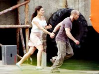 Giselle Itie stars as Sandra and Jason Statham stars as Lee Christmas in Lionsgate Films' "The Expendables". 18846 photo