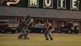 Down-on-his-luck fight promoter Charlie (Hugh Jackman) trains his star robot boxer Atom for a chance to go to the big time in the high-tech boxing world in this scene from Real Steel. 34714 photo