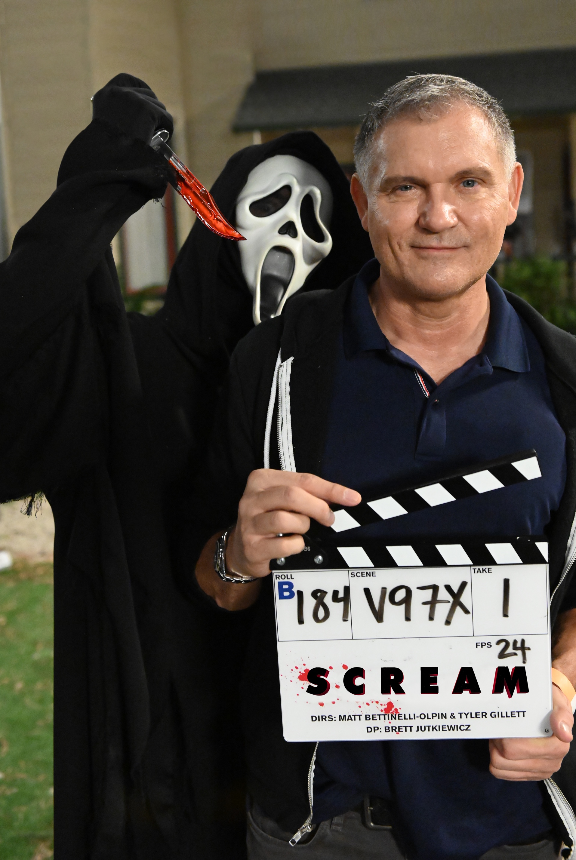  Executive Producer Kevin Williamson and Ghostface on the set of Paramount Pictures and Spyglass Media Group's &quot;Scream.&quot; 