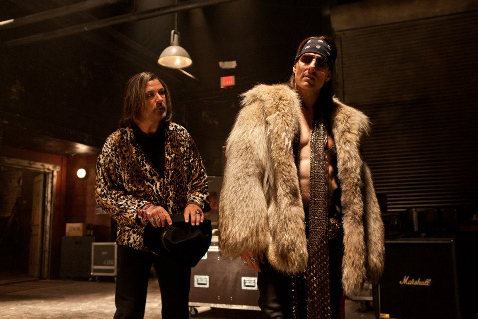  ALEC BALDWIN as Dennis Dupree and TOM CRUISE as Stacee Jaxx in New Line Cinema’s rock musical ROCK OF AGES, a Warner Bros. Pictures release.